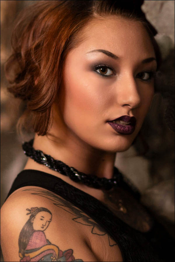 portrait asian alternative model with geisha tattoo