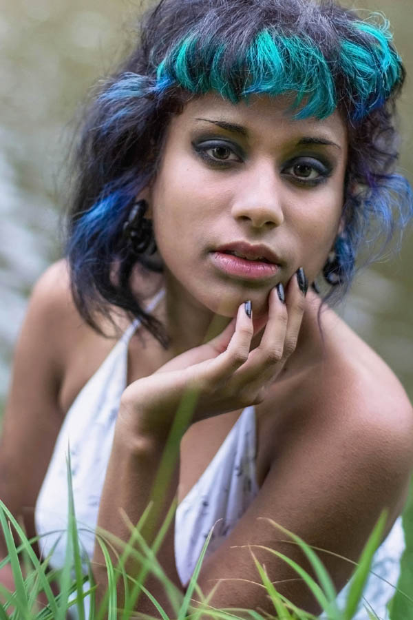 dark skin alternative model with hair color outdoor portrait