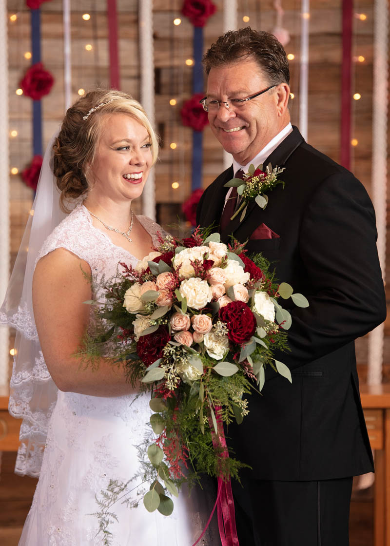 father and bride smiling at Oregon church venue wedding